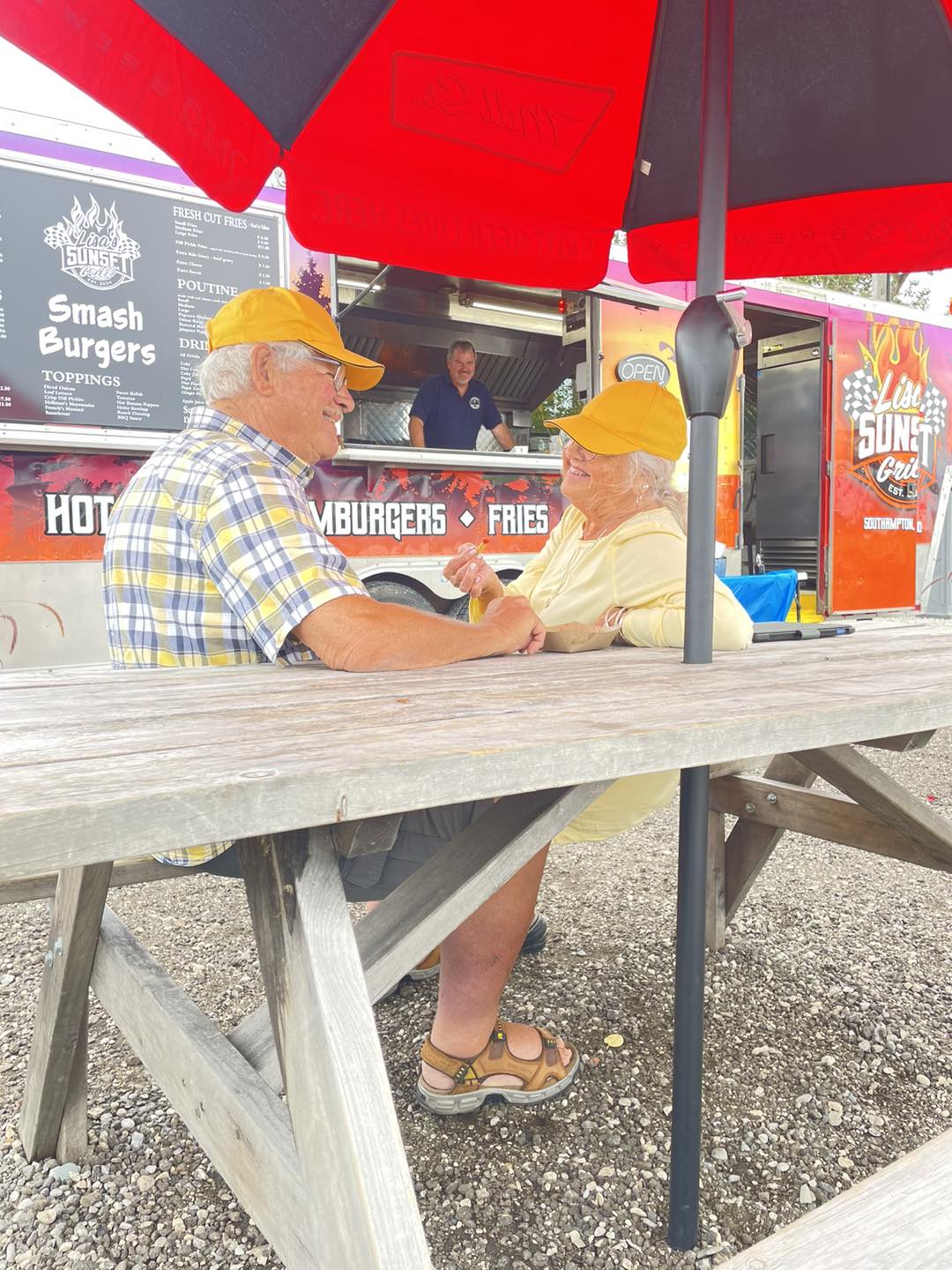 Guests at the picnic tables